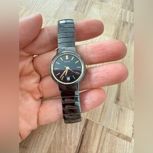 Pulsar ladies black stainless steel and gold tone watch NEW BATTERY